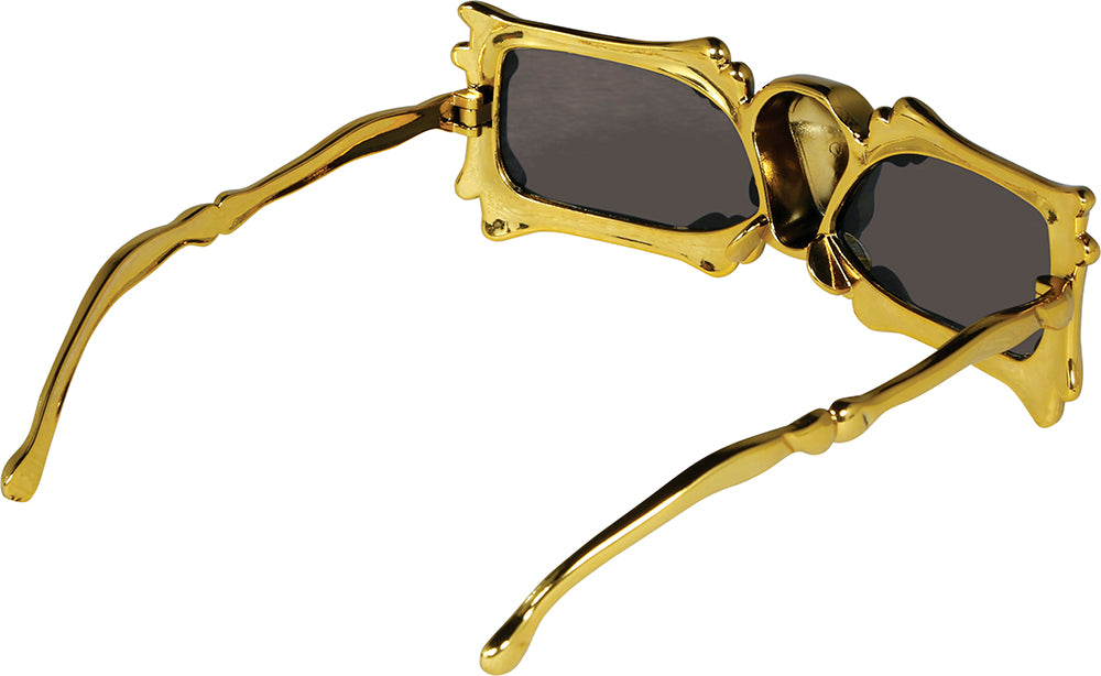 Scheletro con occhiali d'oro