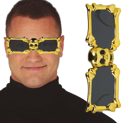 Scheletro con occhiali d'oro