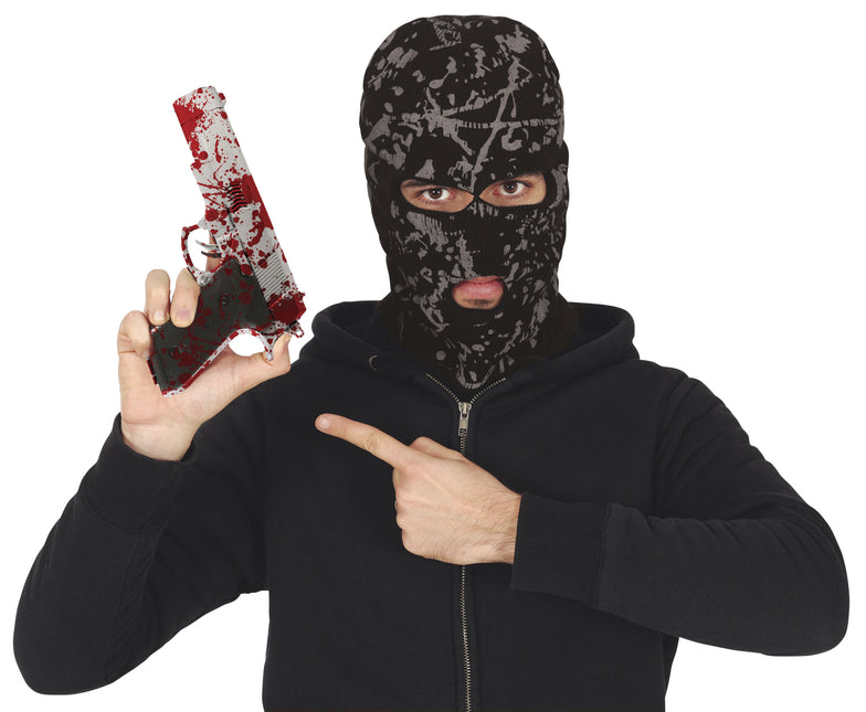 Pistola finta di Halloween con sangue 24 cm