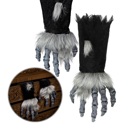 Mostro di Halloween con mano finta e cappotto