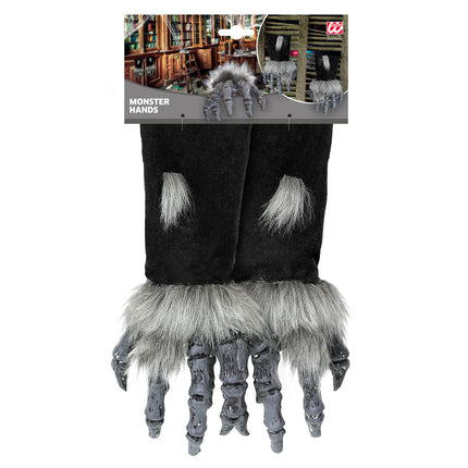 Mostro di Halloween con mano finta e cappotto