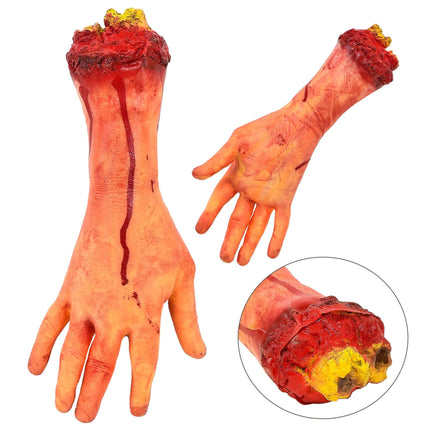 Mano finta di Halloween tagliata con un osso