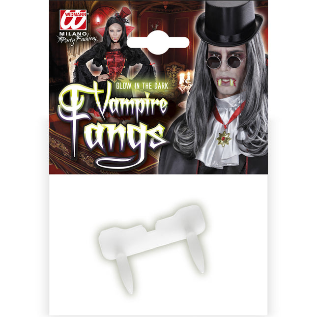DENTE DI VAMPIRO LUMINOSO NELL'OSCURITÀ