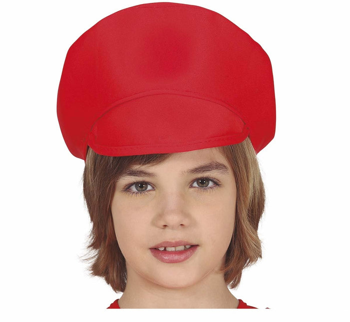 Bambino con berretto rosso