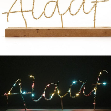 Scaffale con testo Alaaf illuminato