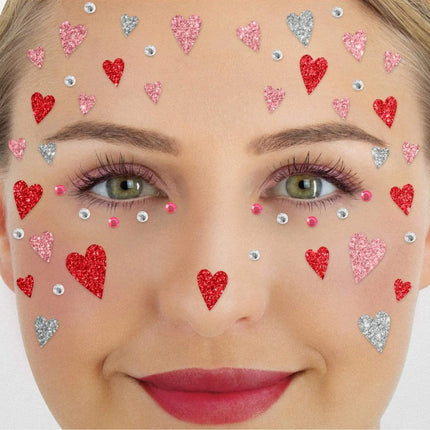 Tatuaggi finti rossi e rosa per il viso con cuoricini glitterati