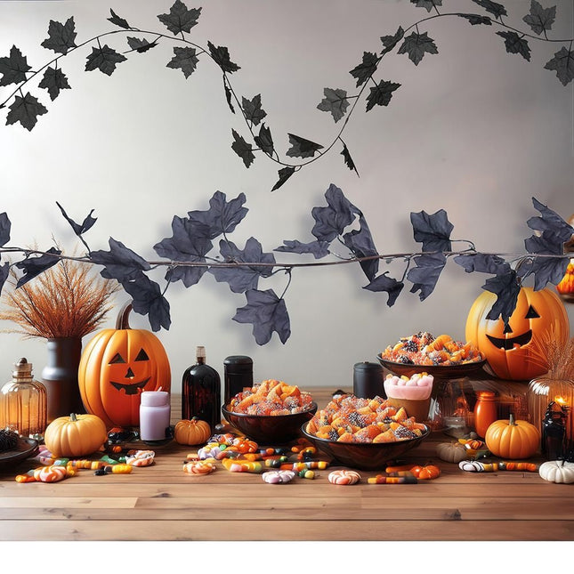 Halloween Zwarte Slinger Bladeren 1,8m van Fiestas Guirca koop je bij Partywinkel