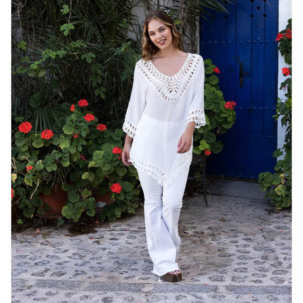 Witte Poncho Dames Salinas van Boland koop je bij Partywinkel